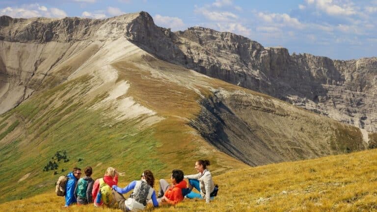 friends chilling by the mountain